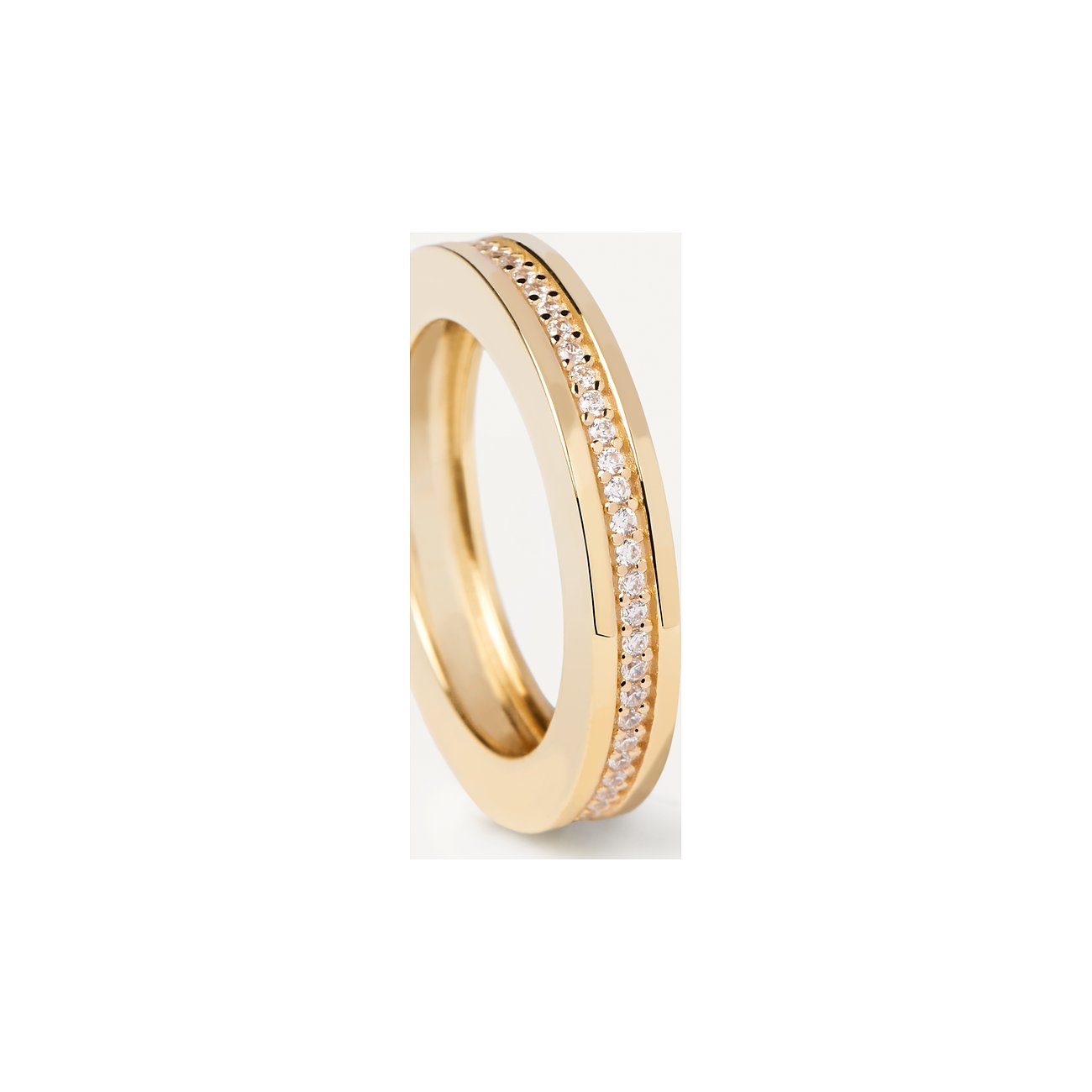 Nahaufnahme eines goldenen PdPaola Rings aus Silber mit einer Reihe funkelnder Zirkonia-Farbsteine in der Mitte.