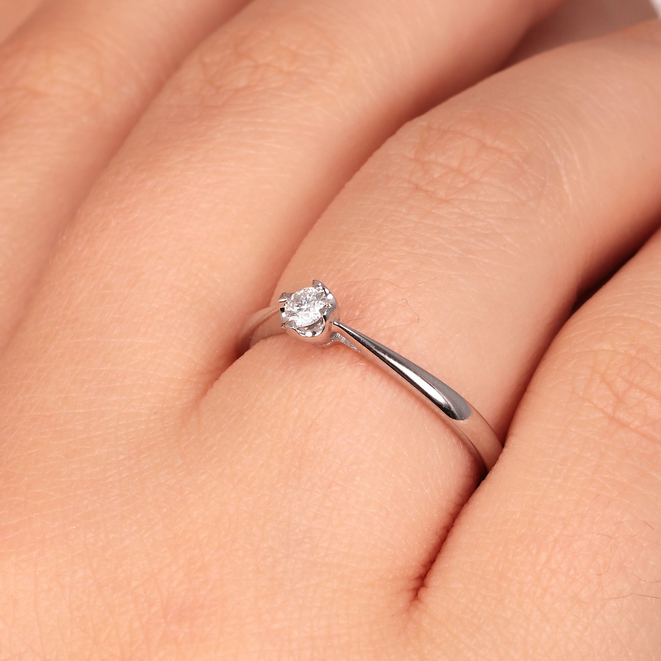 CHRIST Ring aus 585 Weißgold mit Diamant.