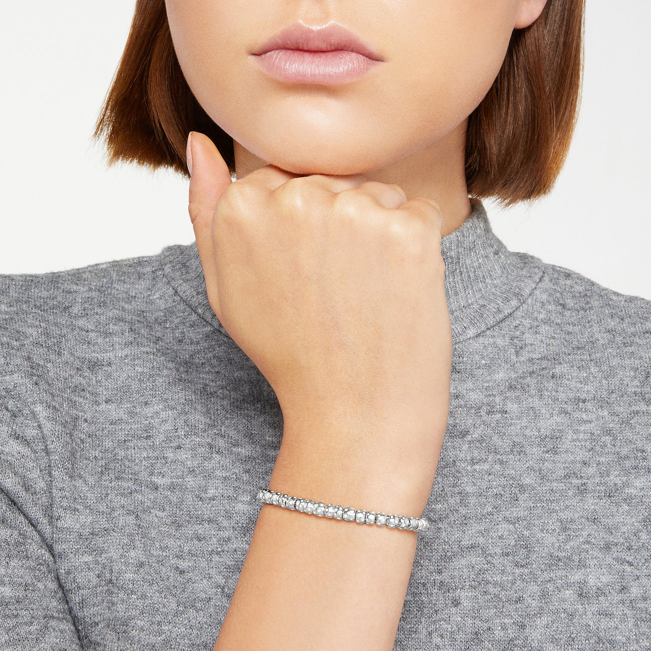DoDo armband van 925 zilver en 750 geel goud met stenen.