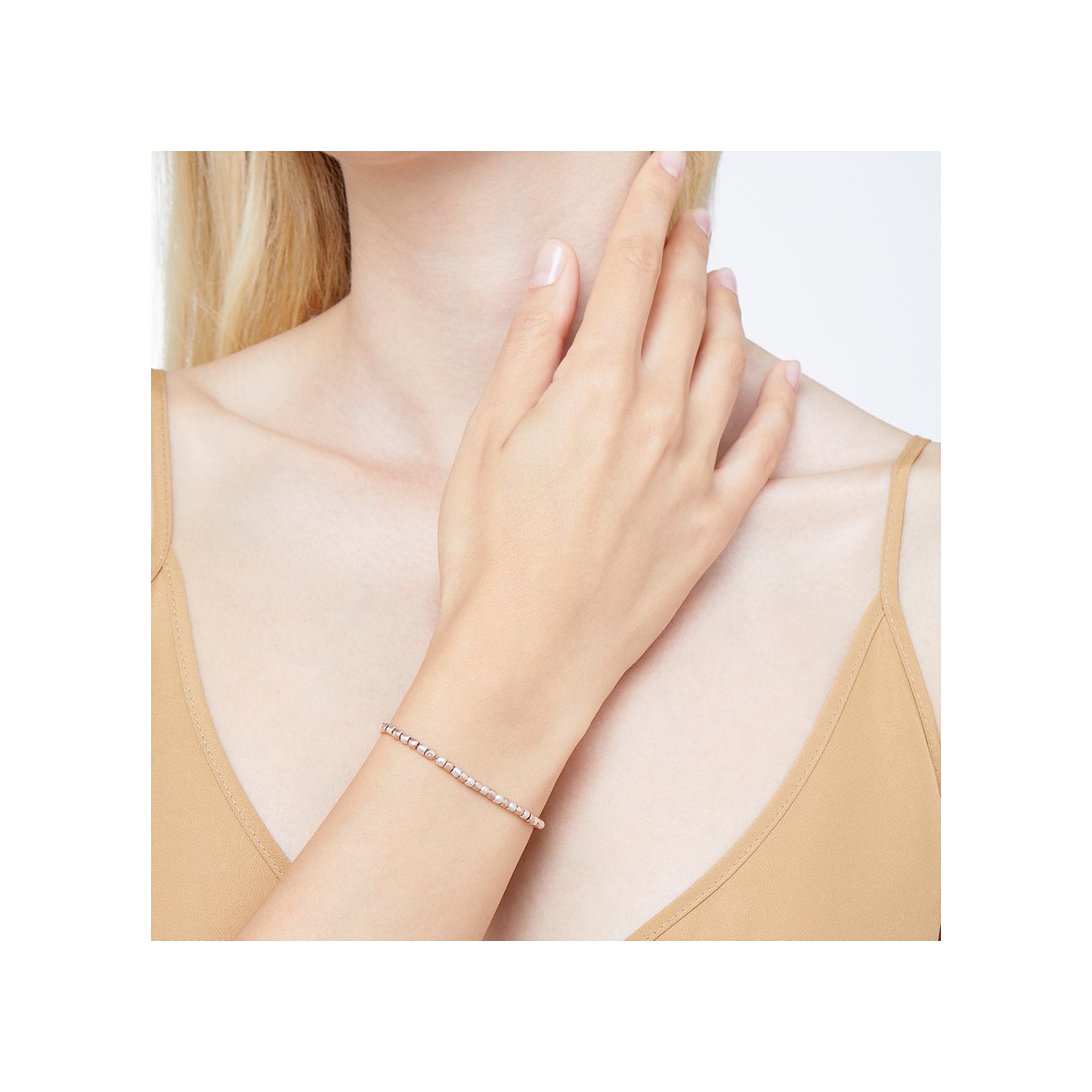DoDo Armband aus 925er Silber und 375er Roségold mit Perlen.