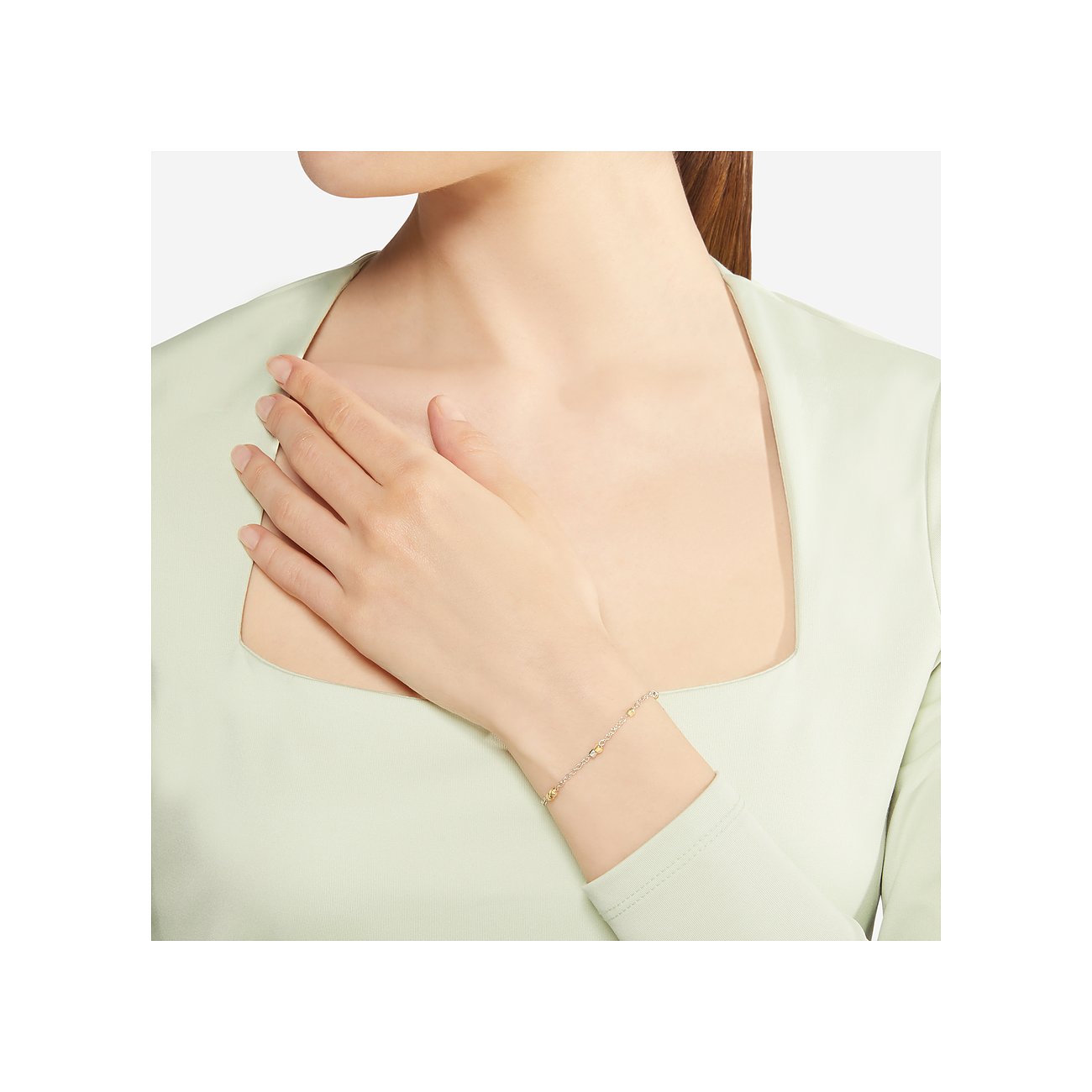 DoDo Armband aus 925er Silber und 750er Gelbgold mit Kugeln.