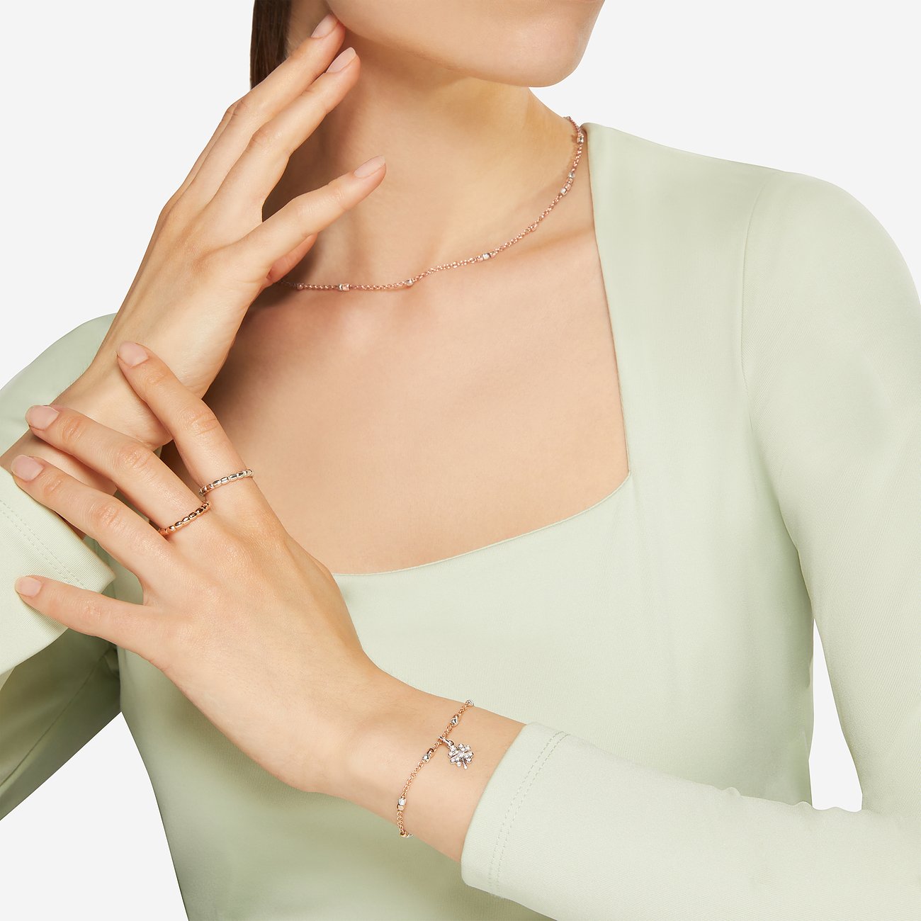 DoDo Armband aus 375 Roségold und 925 Silber mit Kleeblatt-Anhänger.