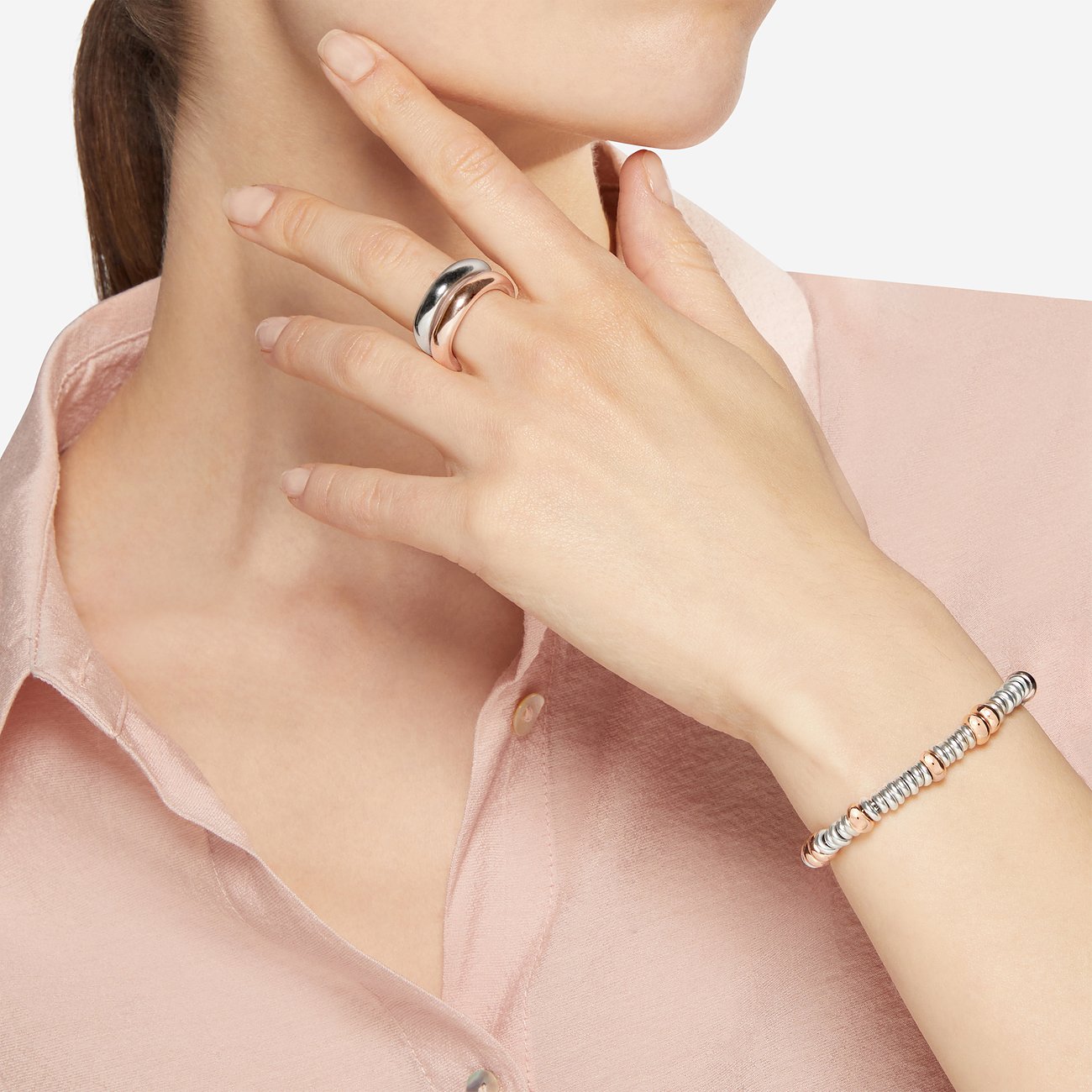 DoDo armband van 925 zilver met roségoudkleurige elementen.