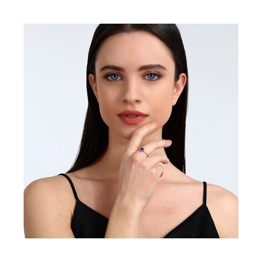 Live Diamond Ring aus 375 Weißgold mit Saphir.