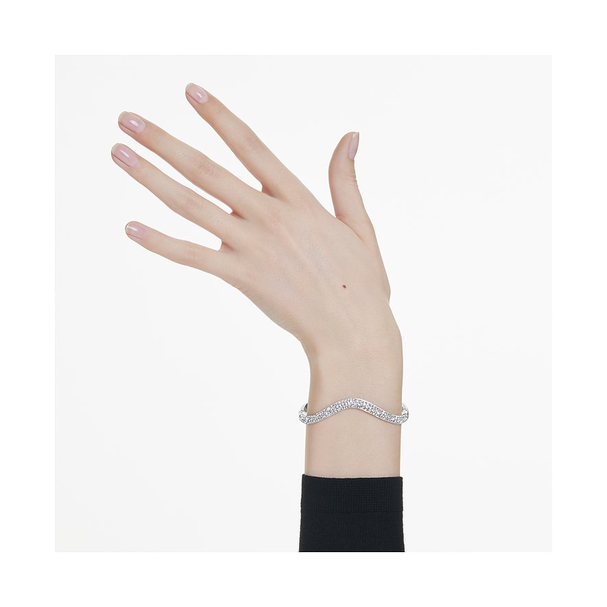 Swarovski Armband aus Metall mit vielen Kristallen in geschwungenem Design.