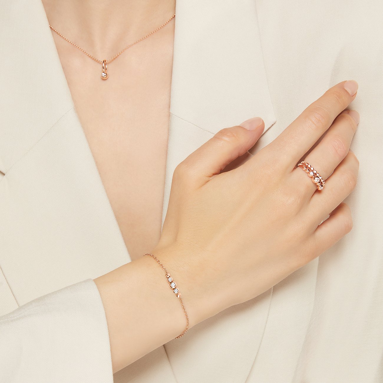 DoDo armband in 9 karaat roségoud met diamanten.