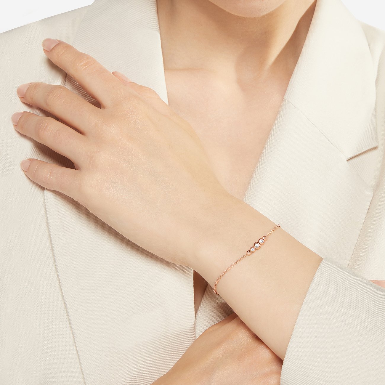 DoDo armband in 9 karaat roségoud met diamanten.