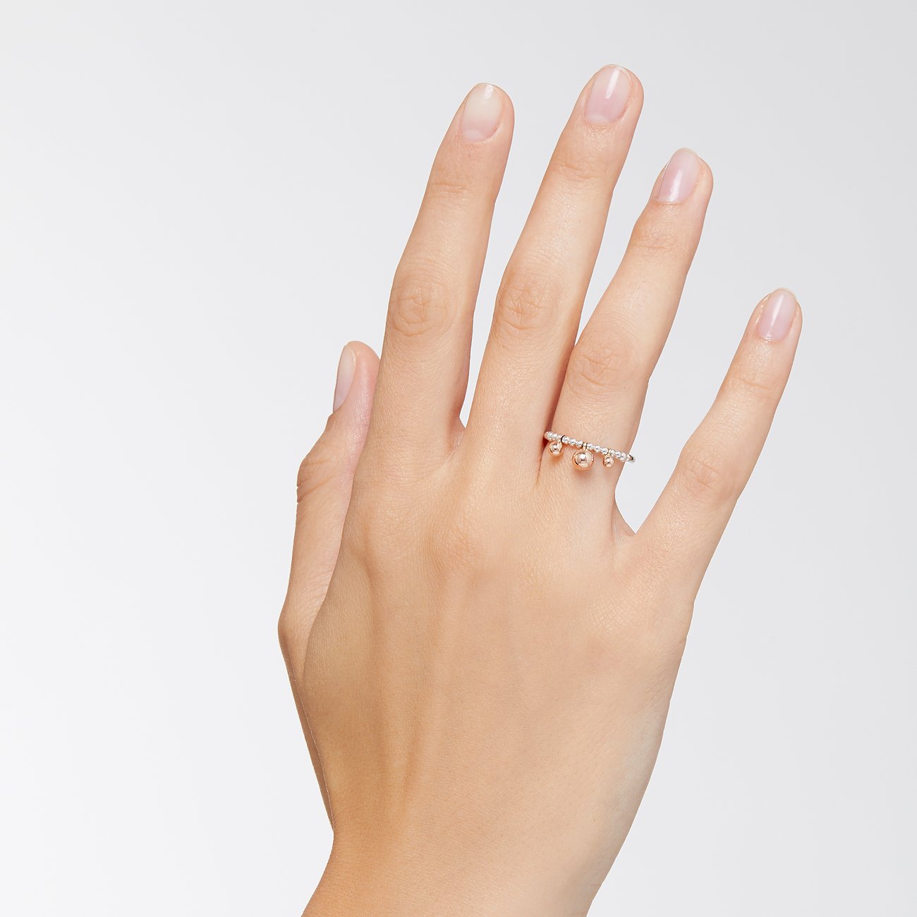 DoDo Ring aus 375 Roségold und 925 Silber mit drei Kugeln.