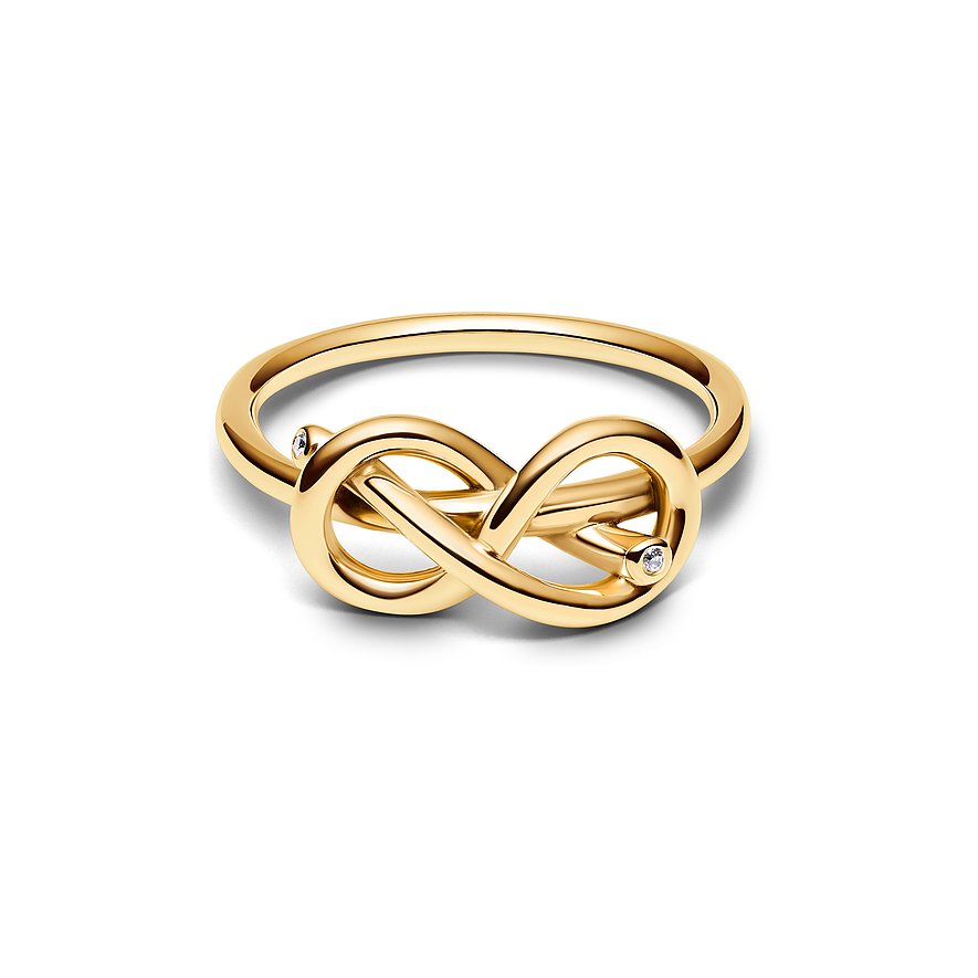 Pandora Ring aus gelbgoldenem Metall mit Unendlichkeitsknoten und zwei glitzernden Zirkonia-Steinen.