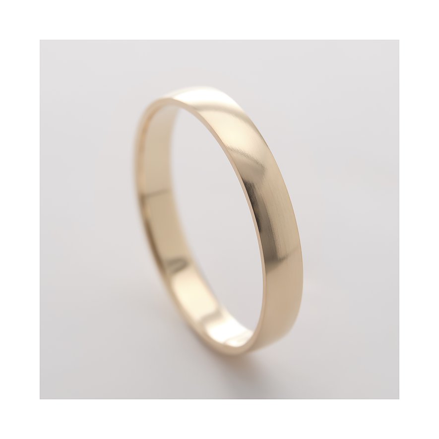 Une bague CHRIST brillante en or jaune 375, photographiée d'en haut. Sa surface lisse reflète légèrement.