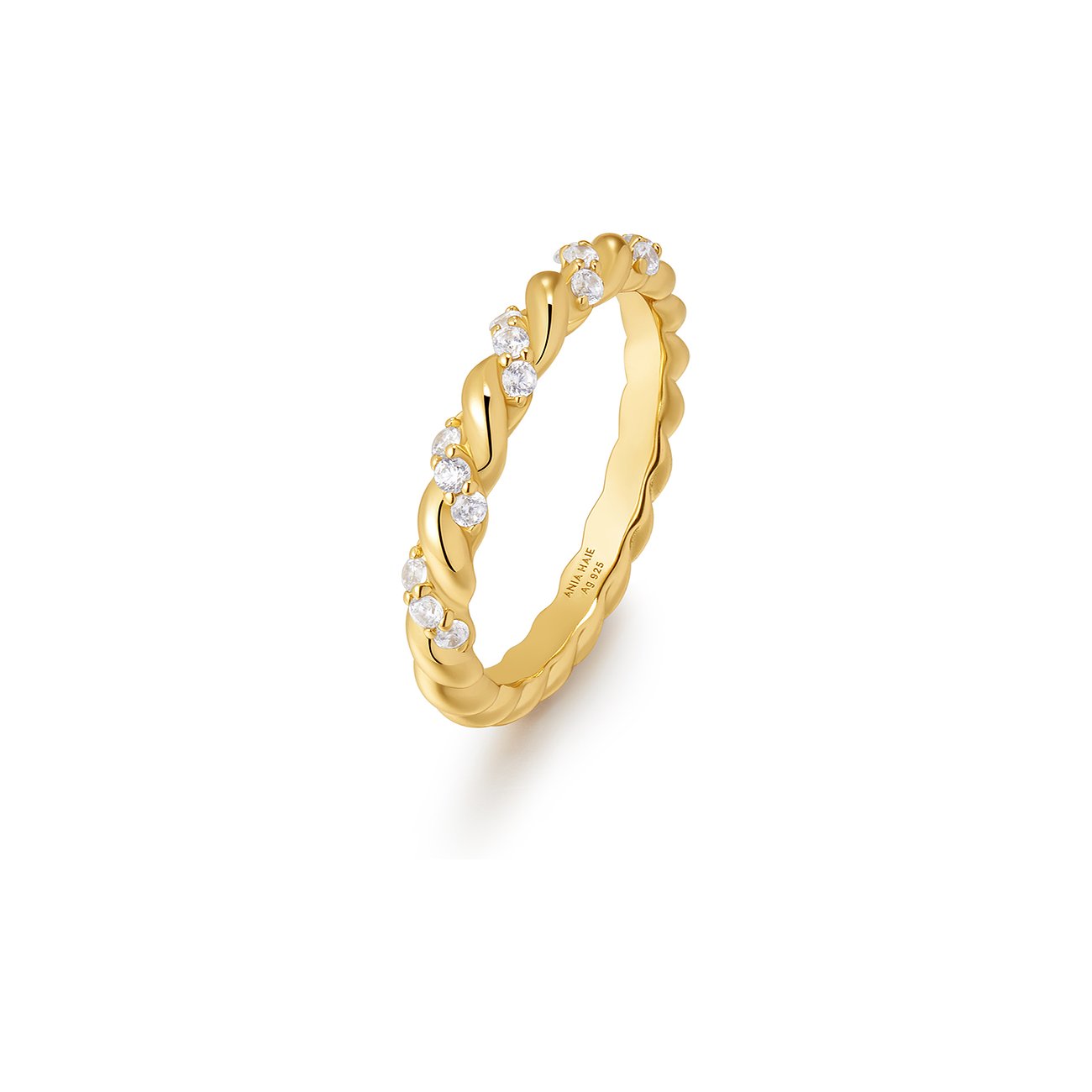 Ania Haie Ring aus vergoldetem Silber mit Zirkonia-Steinen in einer gedrehten Anordnung.