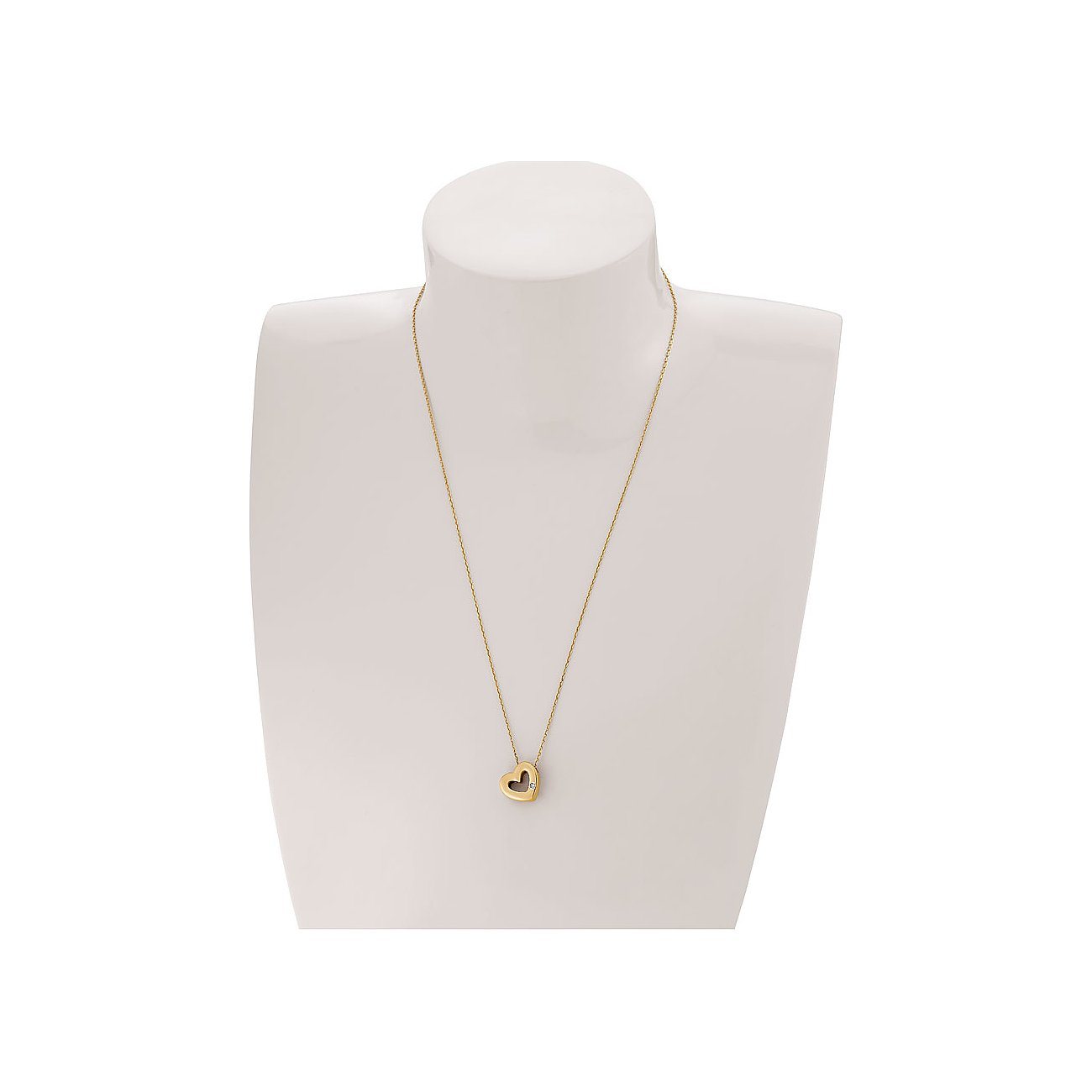 CHRIST Halsschmuck mit einem herzförmigen Gelbgold-Anhänger, verziert mit einem Diamanten, auf einer weißen Büste.