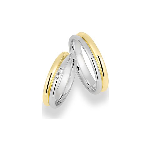 CHRIST Trauringe aus Weißgold und Gelbgold mit drei Diamanten.