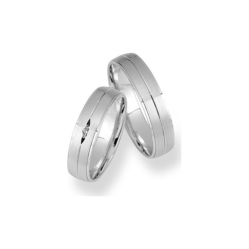 CHRIST Ringe aus konfiguriertem Material mit Steinbesatz und Rillen.