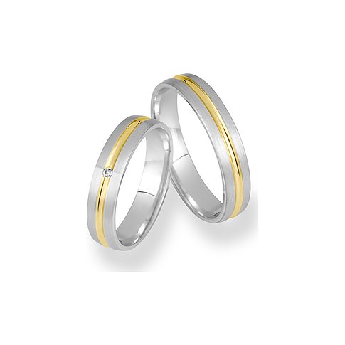 CHRIST Trauringe aus 925er Silber mit Goldakzent und einem Stein.