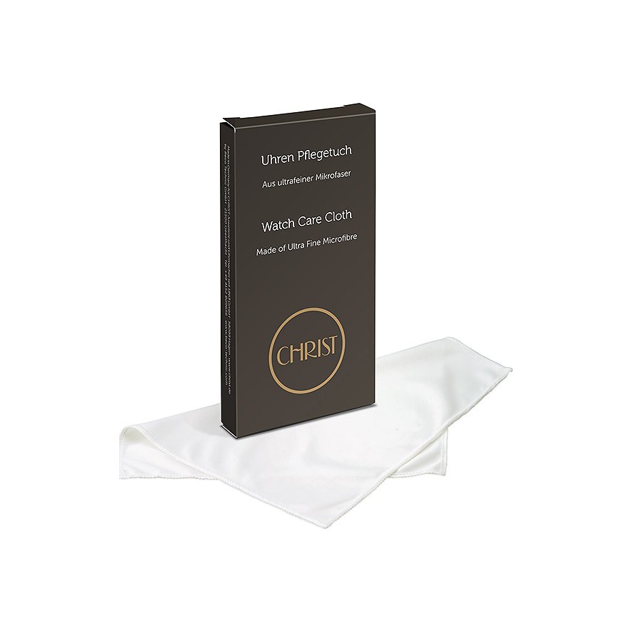 Ein weißes CHRIST Uhren Pflegetuch aus ultrafeiner Mikrofaser liegt entfaltet neben seiner dunkelbraunen Verpackung.