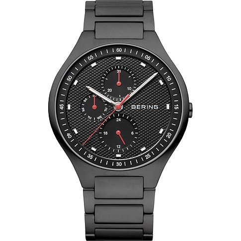 Bering Herrenuhr aus schwarzem Titan mit schwarzem Zifferblatt, drei roten Hilfszifferblättern und roten Zeigern.