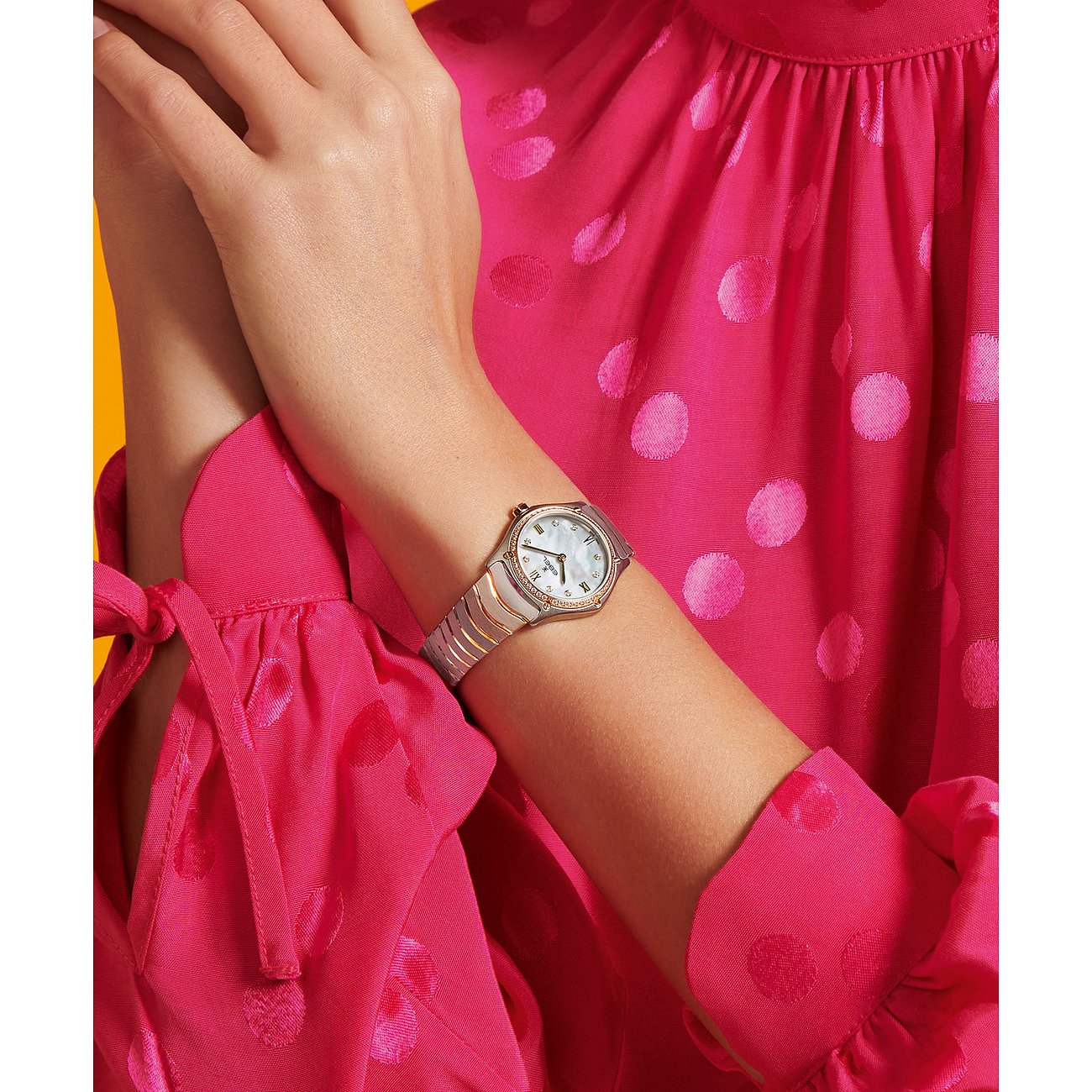 Ebel Damenuhr aus Edelstahl und 750 Gelbgold mit Diamanten.