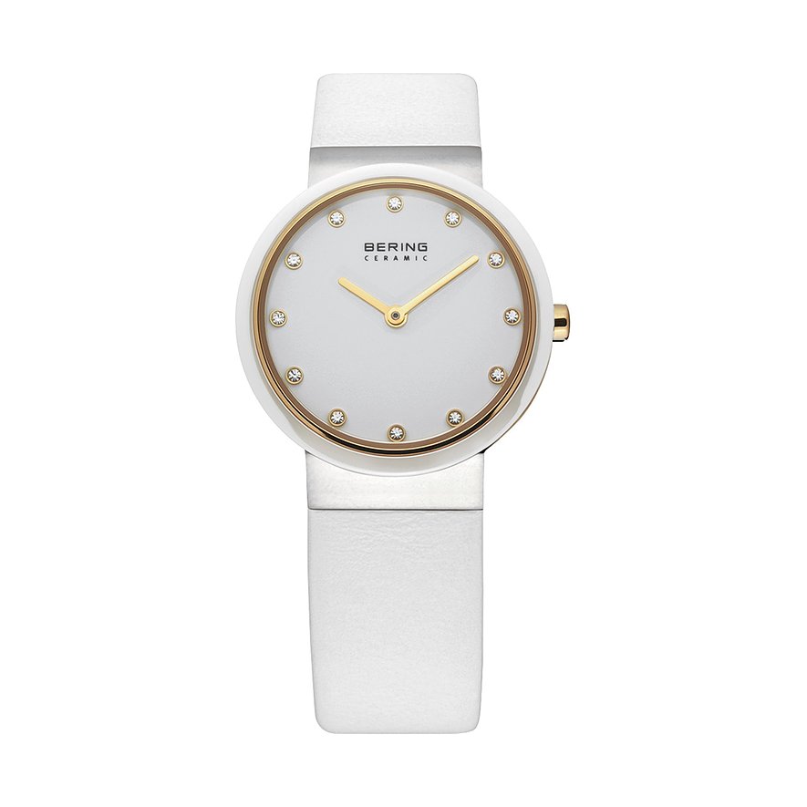 Bering Damenuhr aus weißem Edelstahl mit goldfarbenem Zifferblatt und Swarovski-Kristallen als Zeitanzeigen.