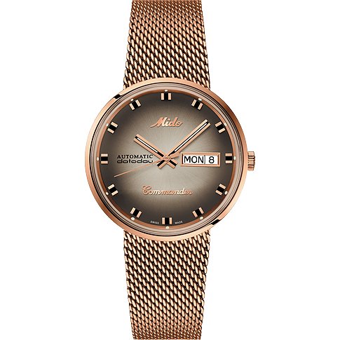 Mido Herrenuhr, PVD beschichtet, roségoldfarben, graues Zifferblatt, Milanaise-Armband. Tag und Datum sichtbar.