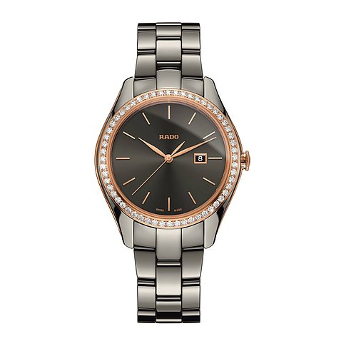 Rado Damenuhr aus dunkelgrauer Keramik mit roségoldenem Rand, besetzt mit funkelnden Diamanten um das Zifferblatt.