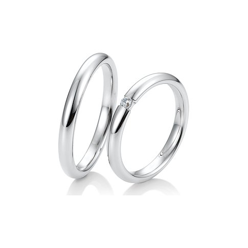 CHRIST Trauring aus Weißgold mit einem Stein.