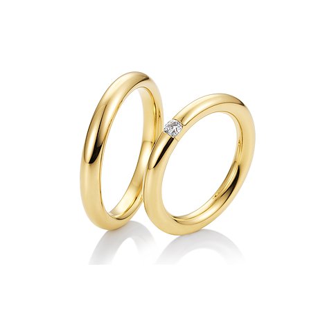 CHRIST Trauringe aus 585 Gelbgold mit einem Stein.