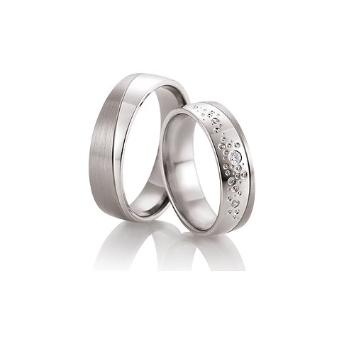 CHRIST Trauringe aus Weißgold mit Diamanten, mattiert und poliert.