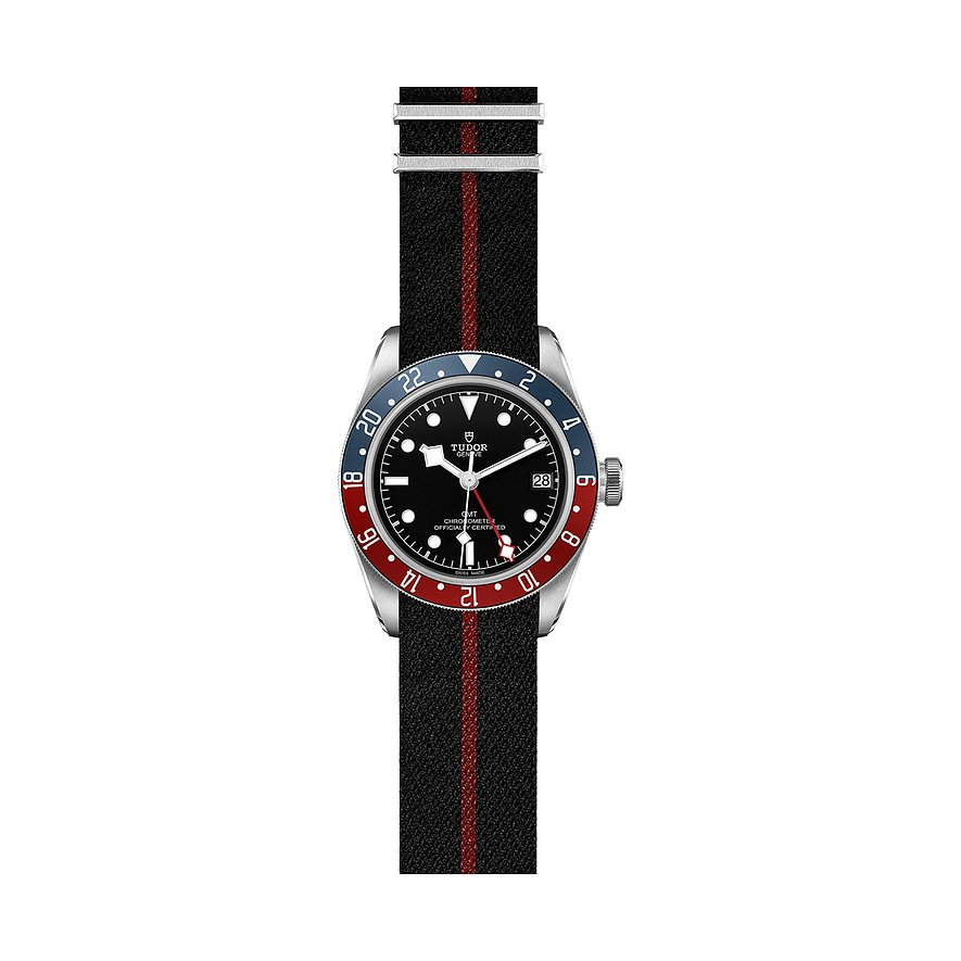 Tudor Herrenuhr mit Edelstahlgehäuse, schwarzem Zifferblatt und rot-blauer Lünette.