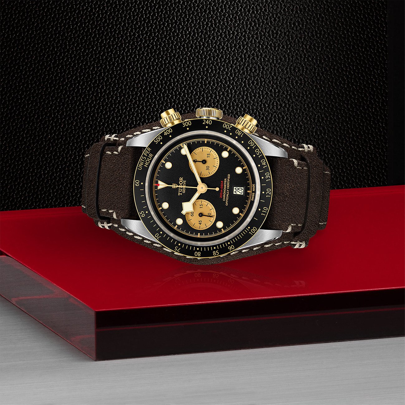 Tudor Herrenuhr mit Edelstahlgehäuse, schwarzem Zifferblatt und Chronographenanzeige.