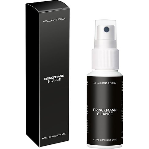 CHRIST Metallband Pflege Spray in schwarzer Verpackung und Flasche.