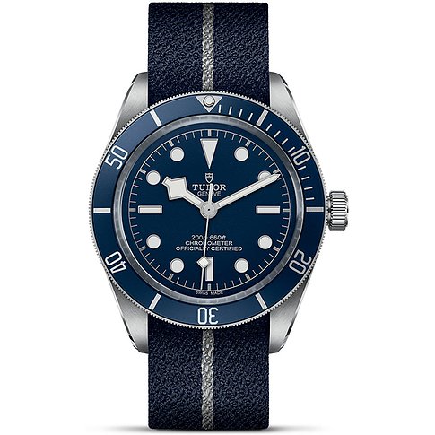 Tudor Herrenuhr mit Edelstahlgehäuse, blauem Zifferblatt und Stoffarmband.