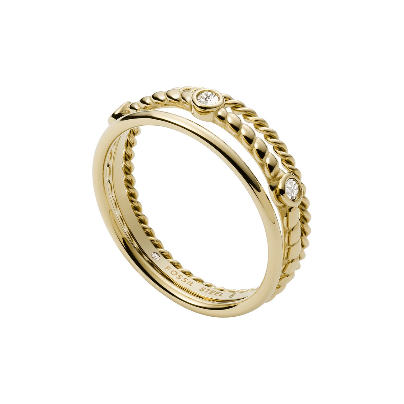 Fossil Ring aus goldfarbenem Edelstahl mit zwei gedrehten Bändern und klaren Glassteinen aus der Vogelperspektive gesehen.