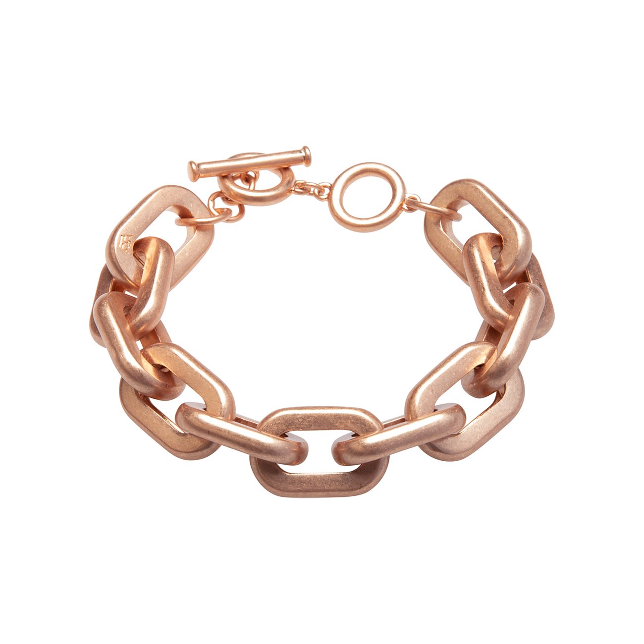 Ein Sence Copenhagen Armband aus mattiertem Messing im Ketten-Design mit Knebelverschluss, Ansicht von oben.