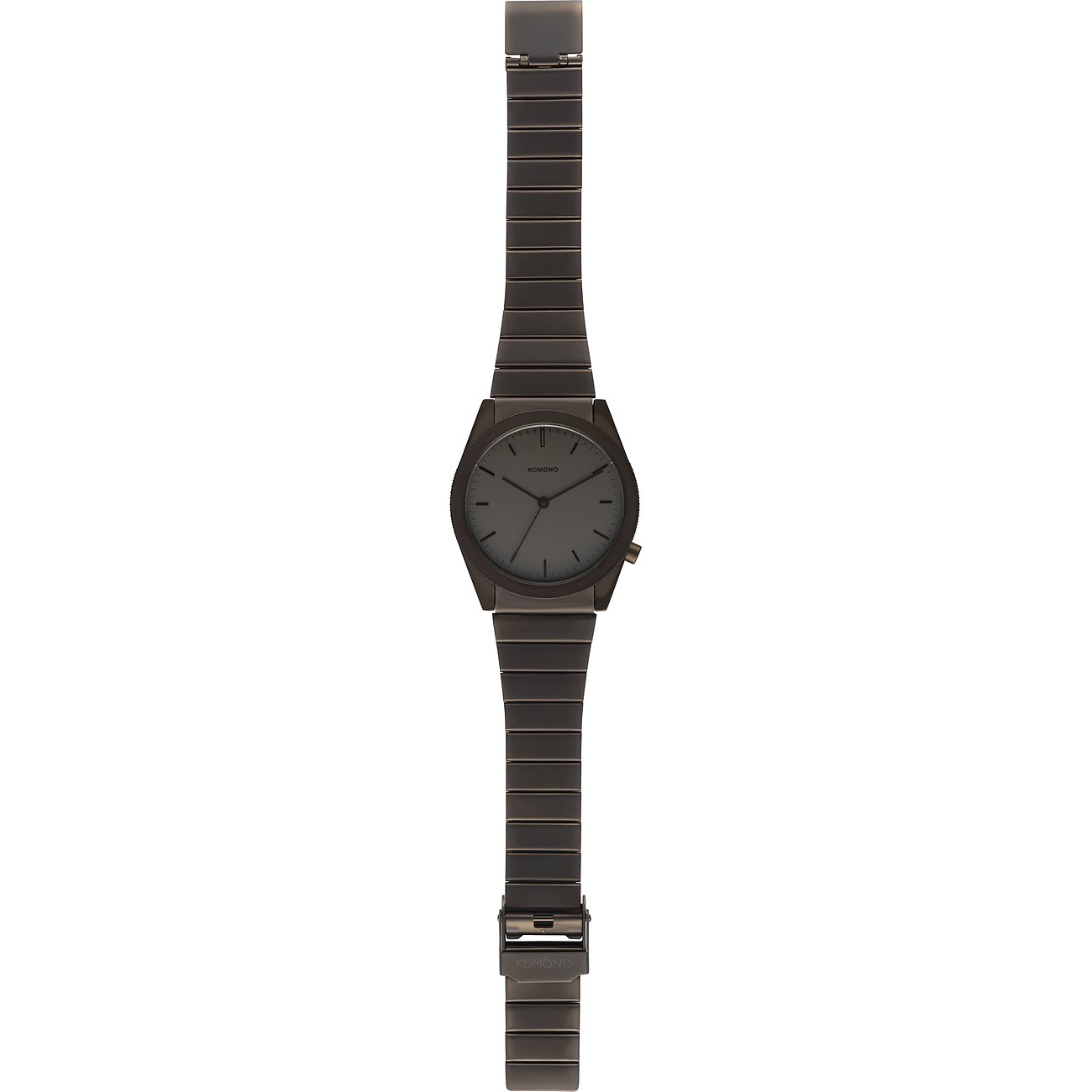 Komono Herrenuhr aus dunkelgrauem Metall mit quadratischem Zifferblatt und schlanken Zeigern.