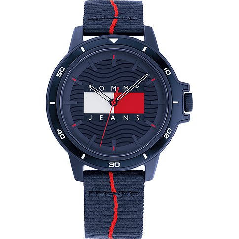 Tommy Jeans Herrenuhr mit grauem Zifferblatt und blauem Keramikgehäuse, Nylonarmband mit rotem Streifen.