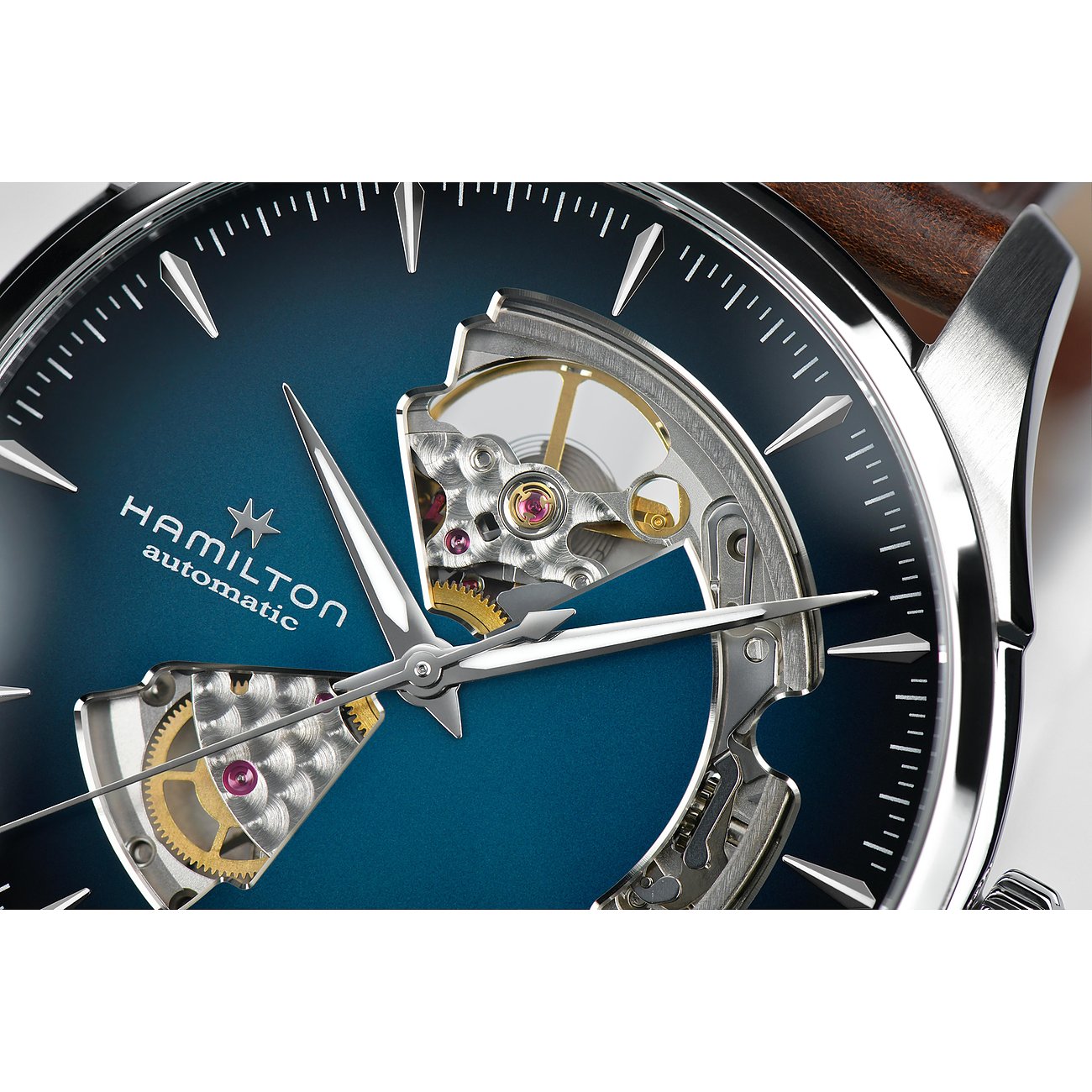 Hamilton Herrenuhr mit Edelstahlgehäuse, blauem Zifferblatt und sichtbarem Uhrwerk.