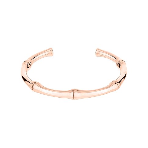 Ett öppet Tamaris-armband i roséguldfärgat rostfritt stål med flätad bambu-look.