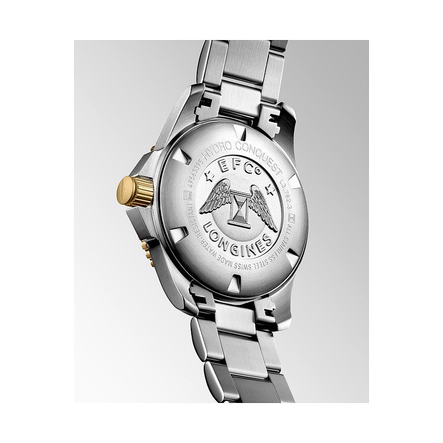 Longines Herrenuhr aus Edelstahl mit goldfarbener Lünette und Metallarmband.