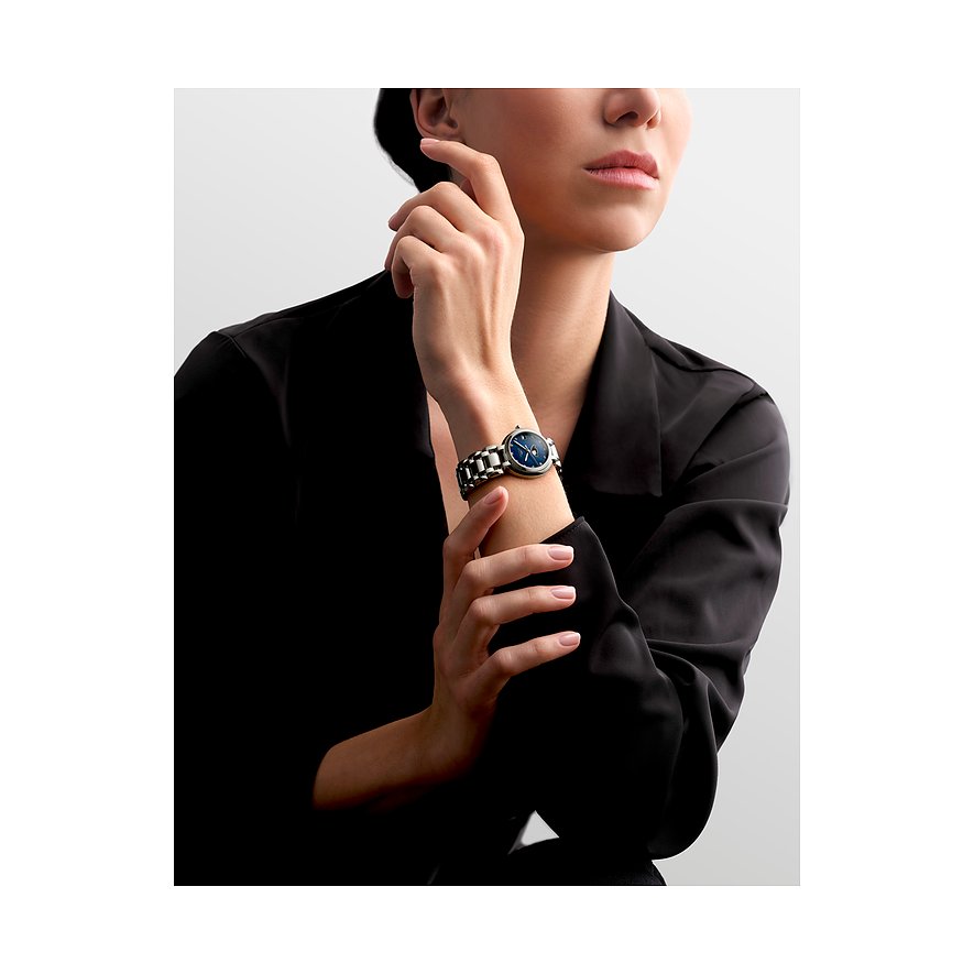 Longines Damenuhr aus Edelstahl mit blauem Zifferblatt und Diamanten.