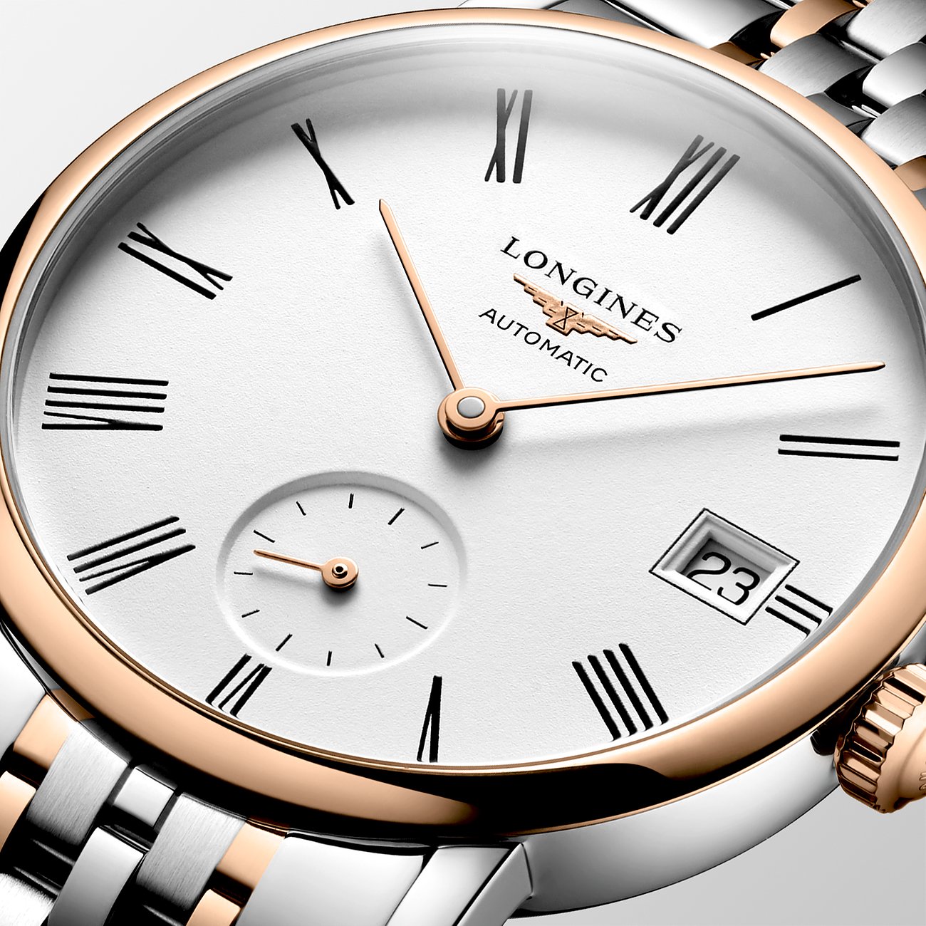 Longines Damenuhr mit Edelstahlgehäuse und Roségold-Akzenten, analog.