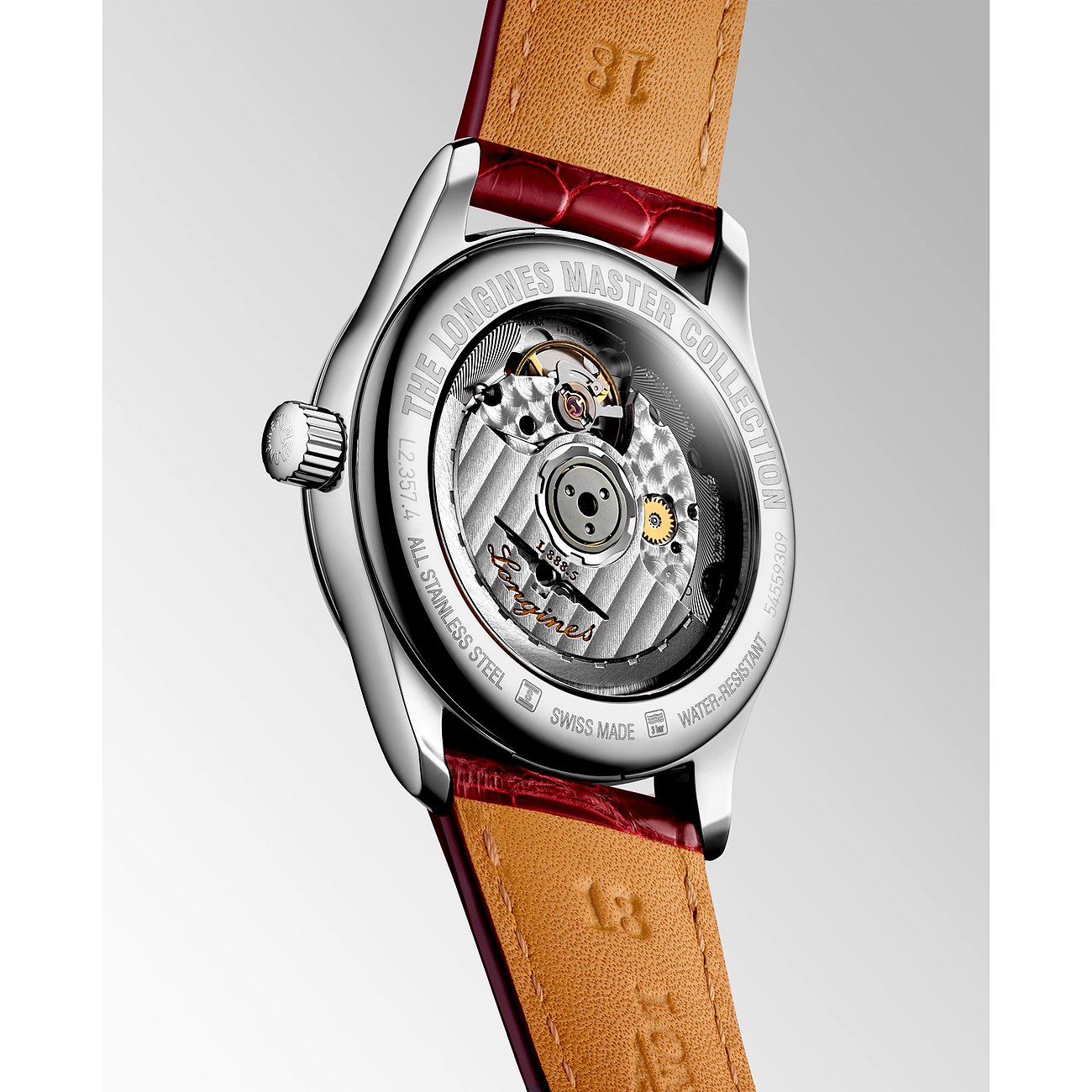 Rückansicht der Longines Damenuhr aus Edelstahl mit sichtbarem Uhrwerk und einem dunkelroten Lederarmband.