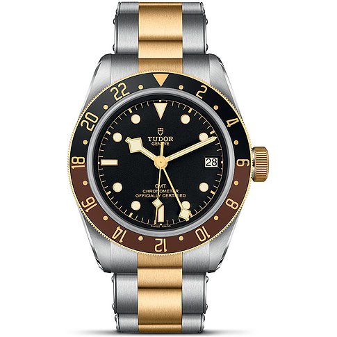 Tudor Herrenuhr mit Edelstahlgehäuse, Gelbgold-Akzenten, schwarzem Zifferblatt und Datumsanzeige.