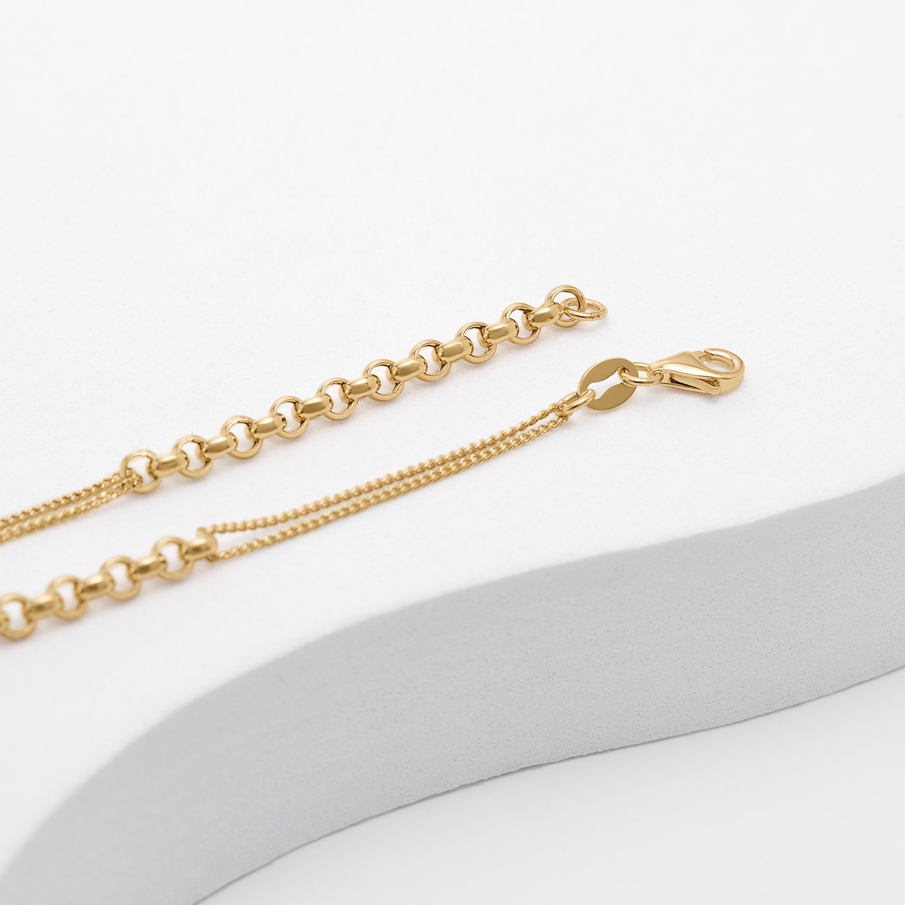 CHRIST Halsschmuck aus 585 Gelbgold, als Anker- und Erbskette mit Karabinerverschluss.