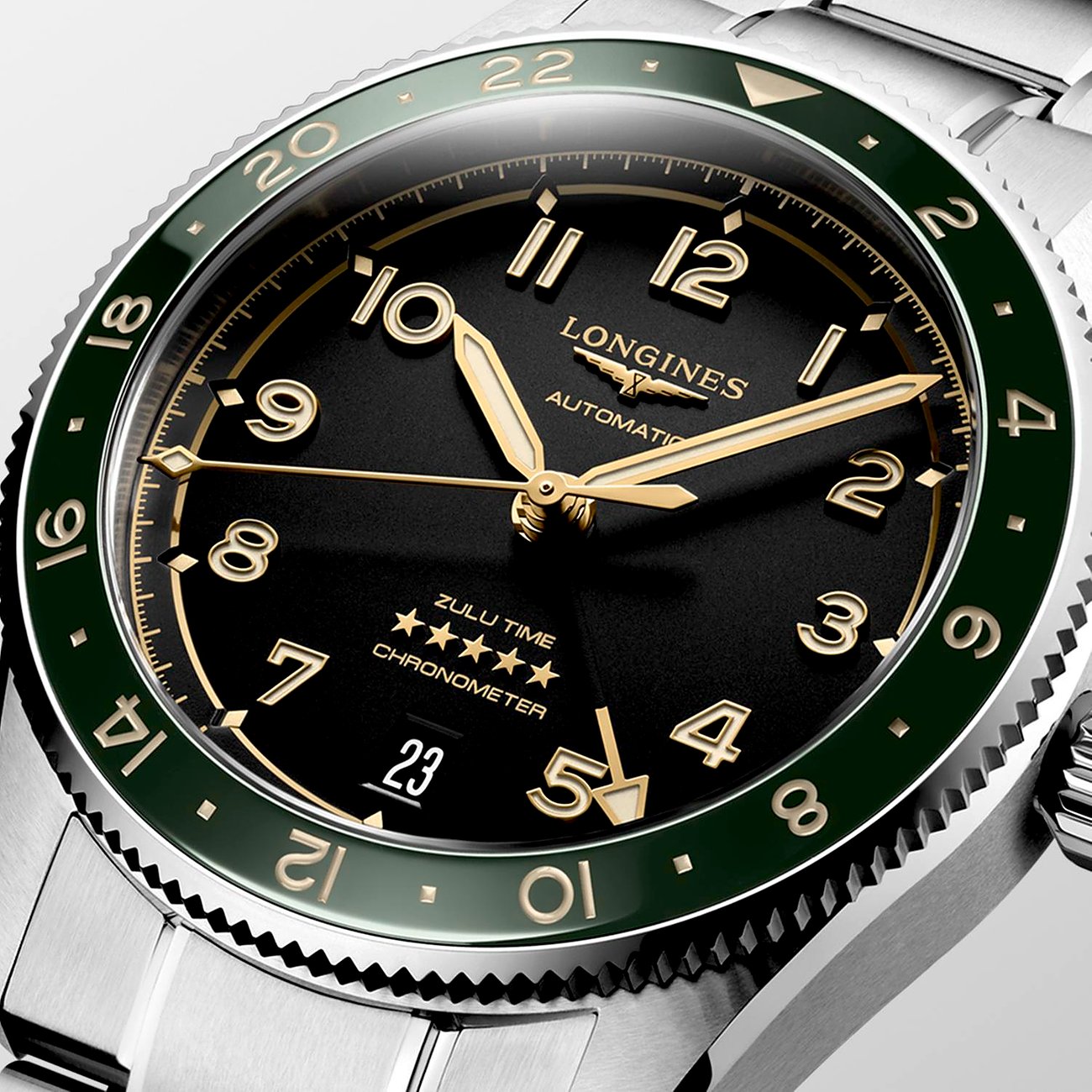 Longines Herrenuhr mit Edelstahlgehäuse, grünem Zifferblatt und goldenen Indizes.