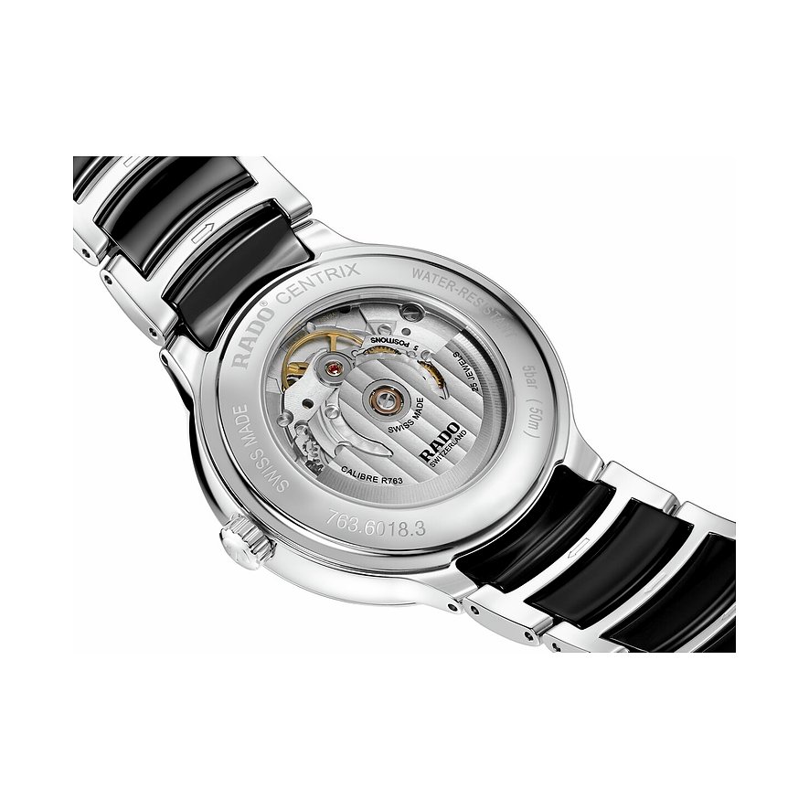 Rado Centrix Quarzuhr aus Edelstahl mit sichtbarem Uhrwerk und schwarzem Armband aus Edelstahl, Rückansicht.