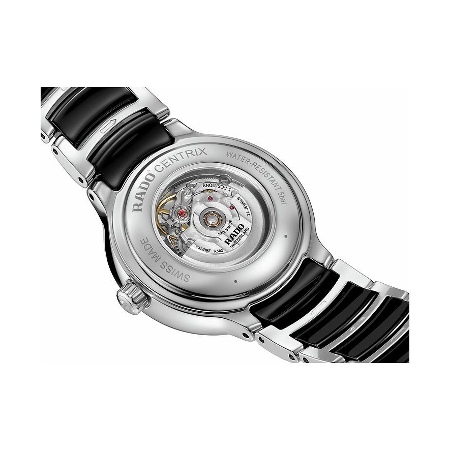 Rado Damenuhr aus Edelstahl von hinten, mit Blick auf das transparente Uhrwerk und das schwarze Armband.