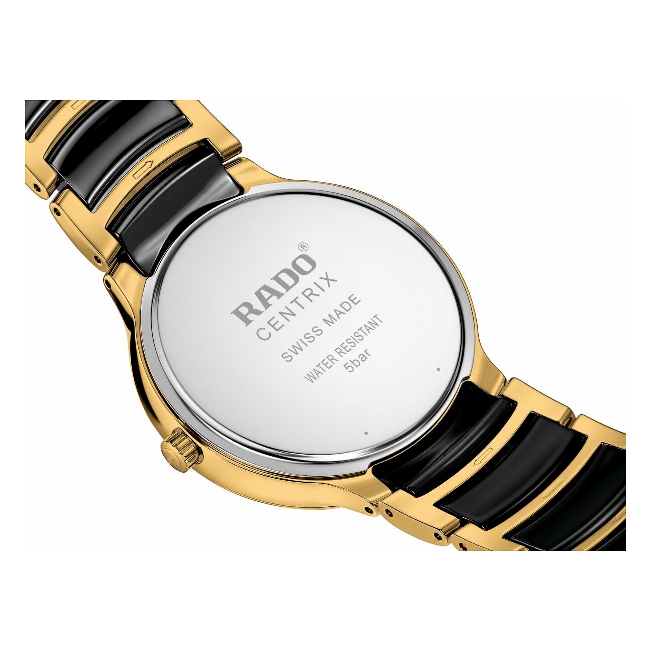 Rado Centrix Quarzuhr aus goldfarbenem Edelstahl und schwarzer Keramik von hinten mit Gravuren für Wasserdichtigkeit.