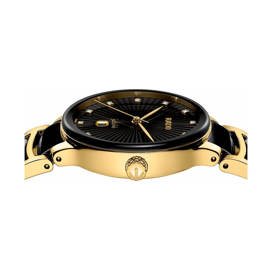 Nahaufnahme einer luxuriösen Rado Damenuhr aus goldfarbenem Edelstahl mit schwarzem Zifferblatt und Diamanten.