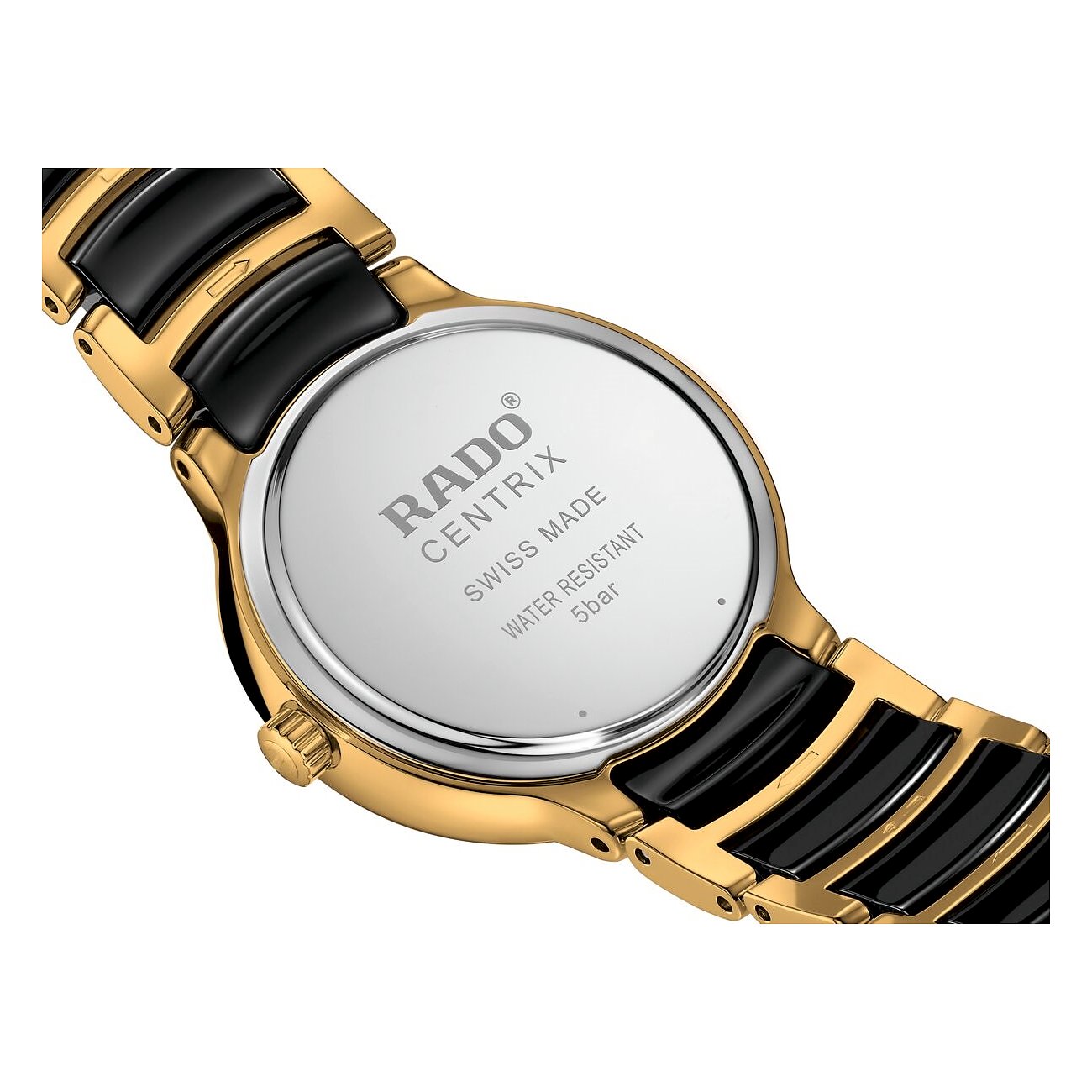 Rado Centrix Damenuhr aus goldfarbenem Edelstahl von schräg hinten unten mit dem gravierten Gehäuseboden.